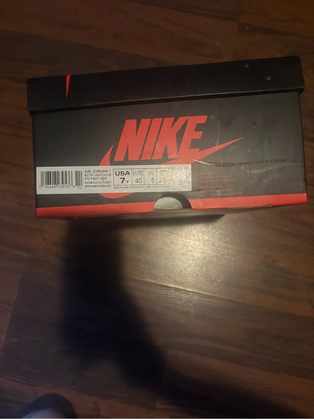 Nike Black Box with Red Swoosh Logo